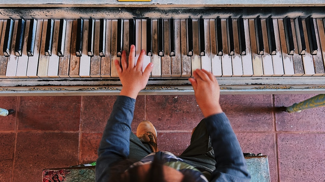 a person playing a piano